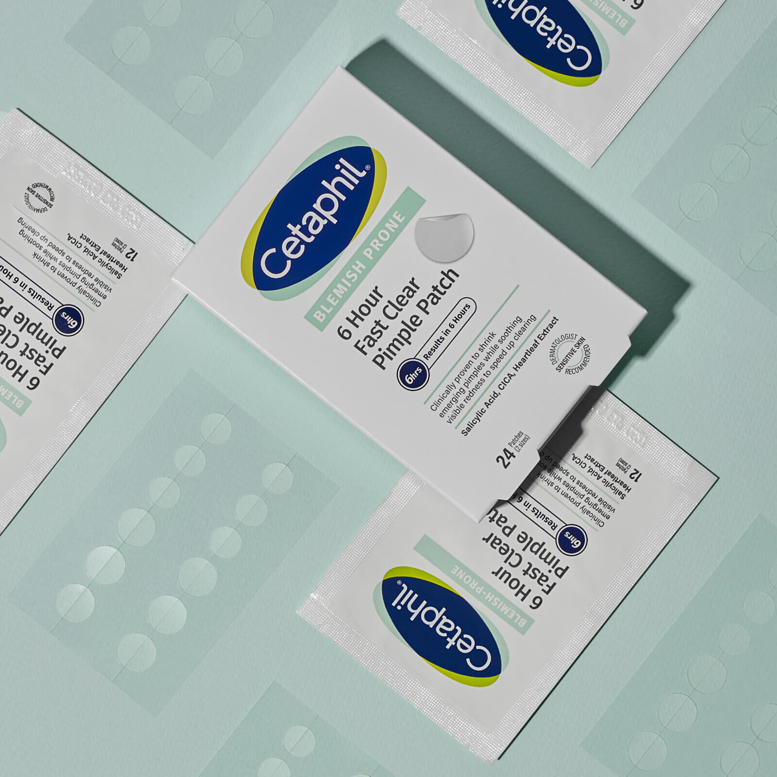 Kompozycja z opakowań i blistrów plastrów na pryszcze Cetaphil.
